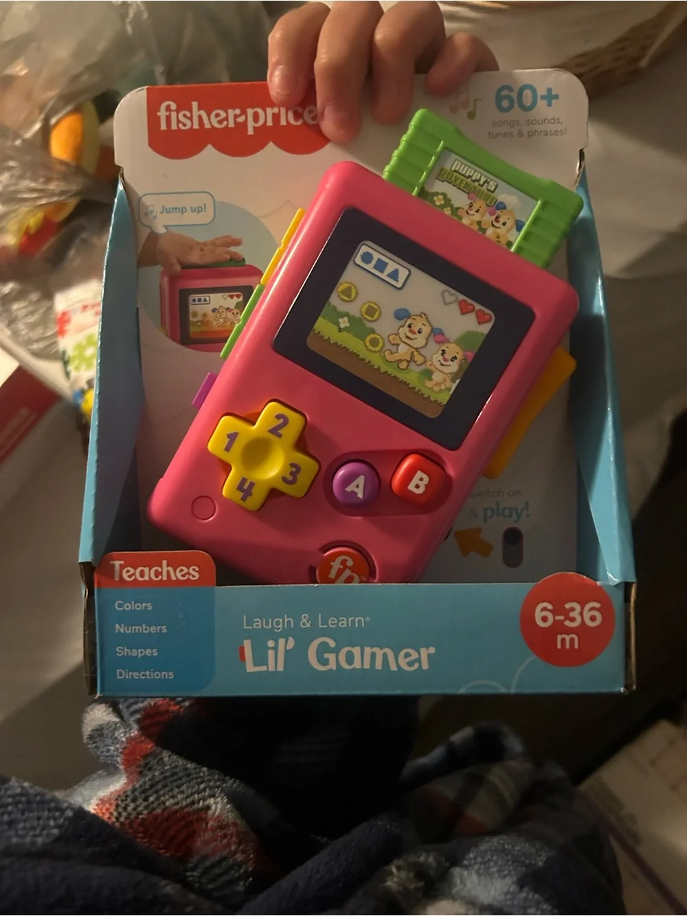 Fisher-Price Pink Handheld Lil' Gamer Toy with Yellow Buttons